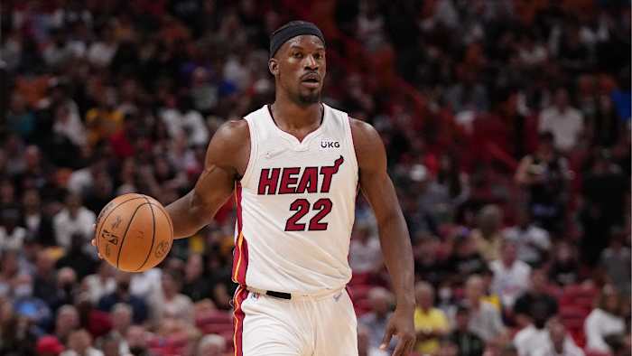 Mar 23, 2022; Miami, Florida, USA; Miami Heat forward Jimmy Butler (22) dribbles the ball up the court against the Golden State Warriors during the first half at FTX Arena. Mandatory Credit: Jasen Vinlove-USA TODAY Sports